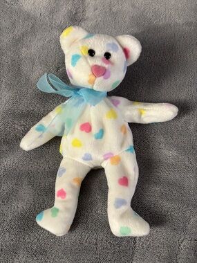 Ty Beanie Baby "Kissme" the Bear, a collectible stuffed animal released in 2001